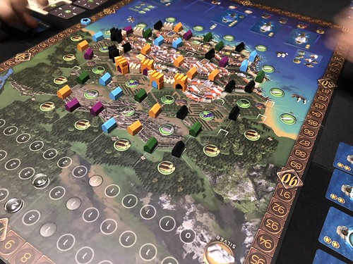 Ragusa Board game with colorful pieces on a detailed map
