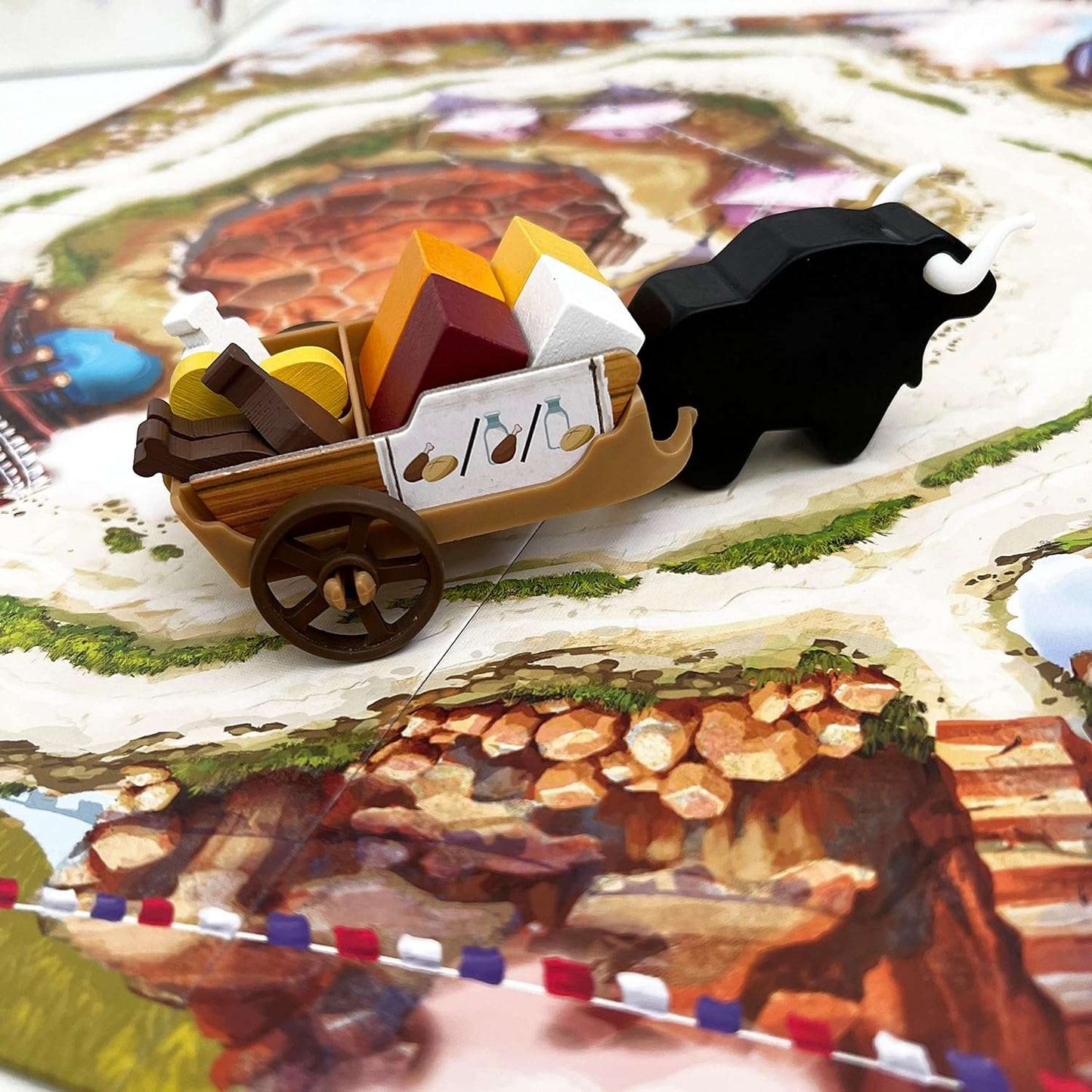 YAK - an economy-building board game by Michael Luu.